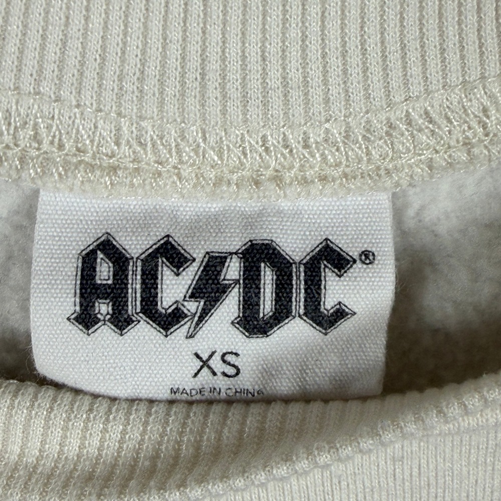 AC/DC Women XS Graphic Lightning Bolt Cropped Sweatshirt Cream Raw Hem Cotton - Picture 3 of 9